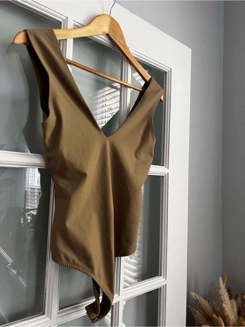 Sleeveless Tan V-Neck Asymmetric Bodysuit - Picture 4 of 7